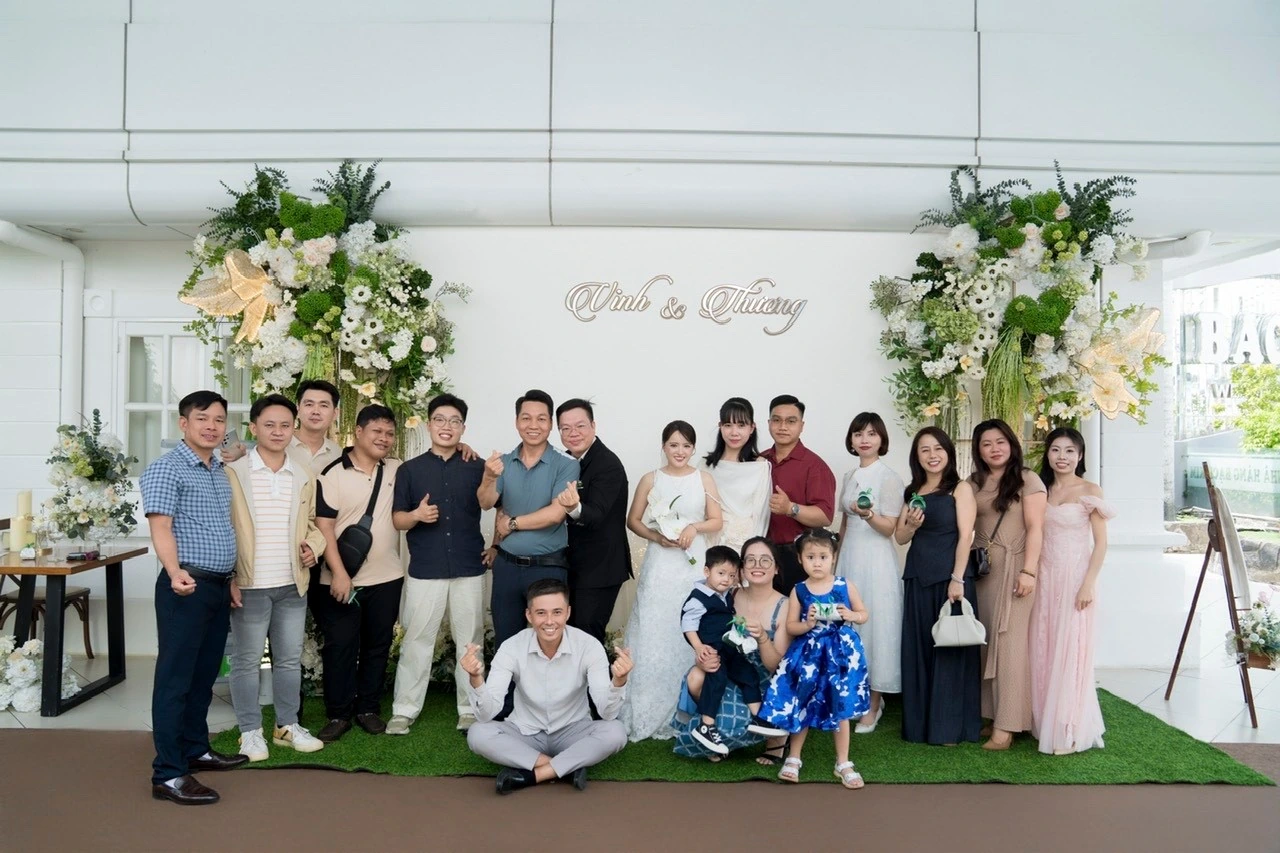 Team members and families celebrating a colleague’s special day